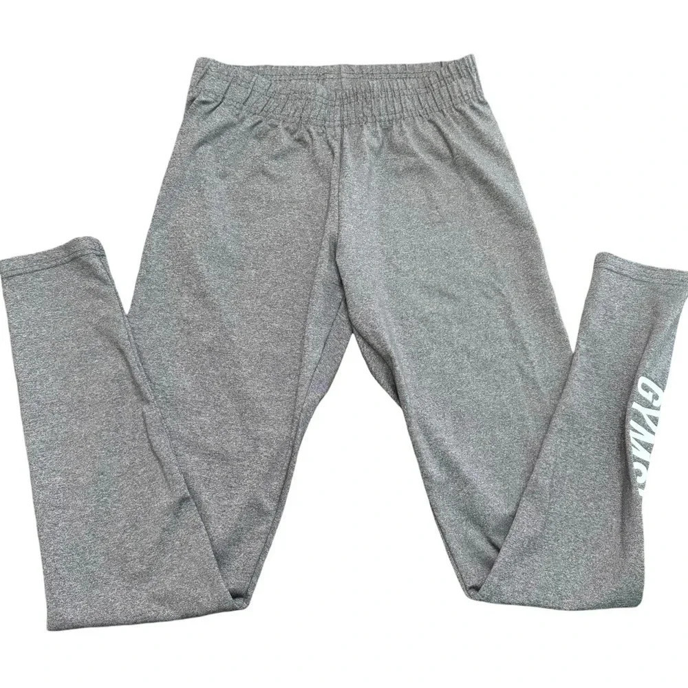 Gymshark leggings with logo on side leg. Gray, size small. Wide elastic waist.